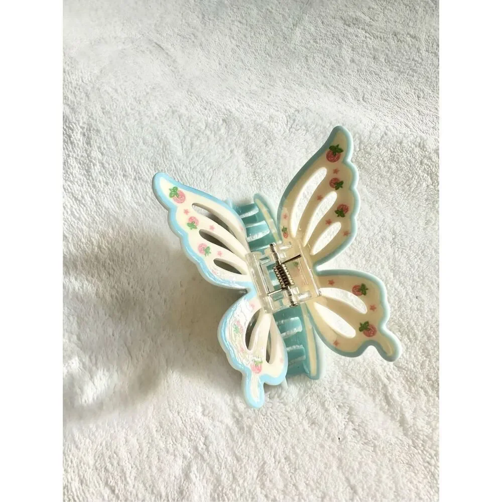 Adorable strawberry pink, blue, and cream - butterfly hair claw ￼